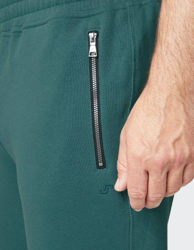 Joy Sportswear Freizeithose MAX Wärmende Hose mit modischem Zipper Kostenloser Versand