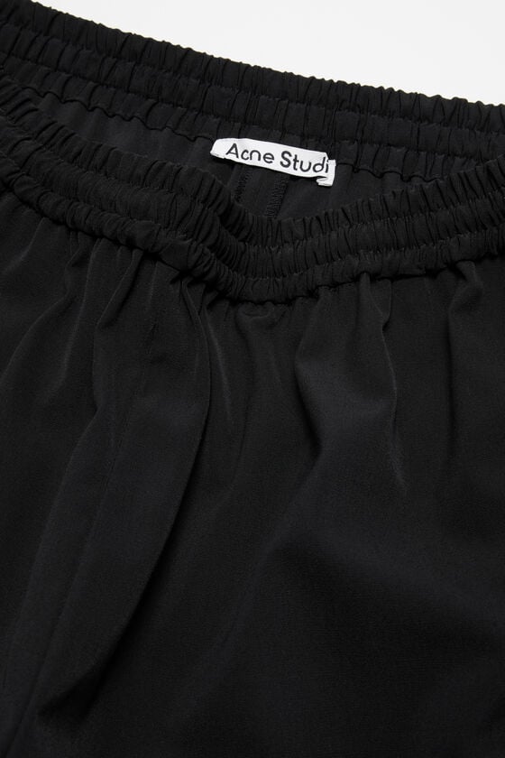 Acne Studios Figurnahe Hose VIP-Rabatte