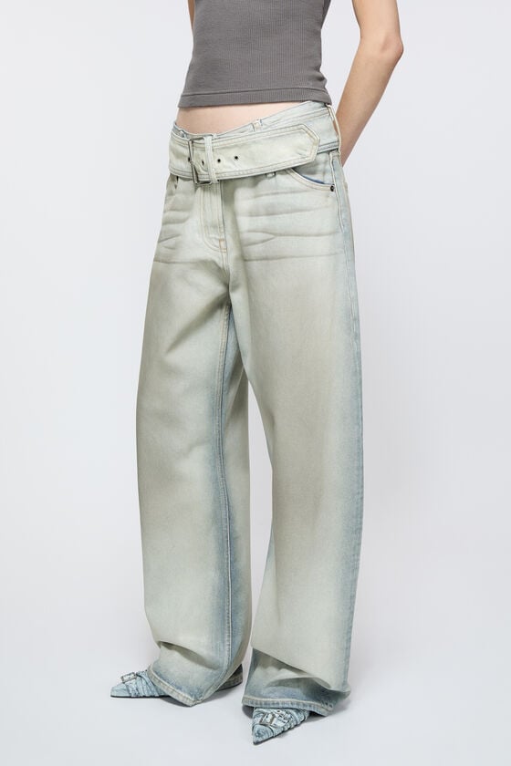 Acne Studios Coated denim trousers Im Verkauf