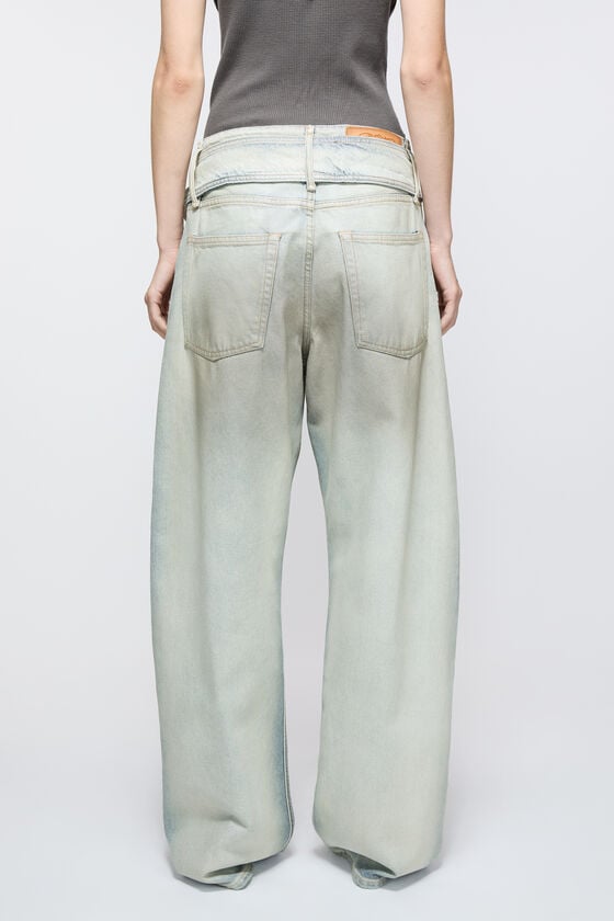 Acne Studios Coated denim trousers Im Verkauf