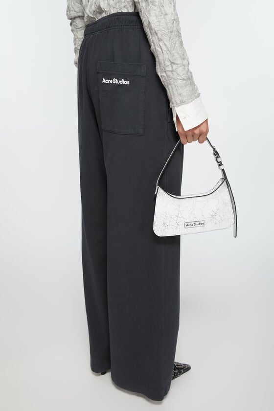 Acne Studios Jogginghose mit Logo-Stempel 50% Rabatt für begrenzte Zeit