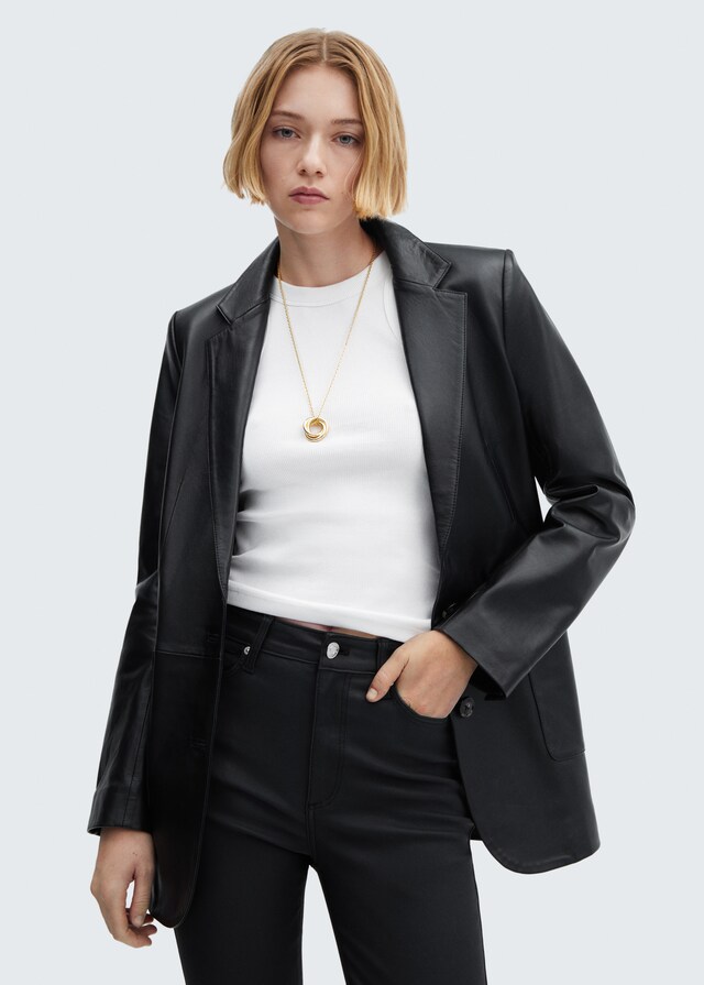 Mango Skinny Coated-Jeans mit hohem Bund Neueste Stile