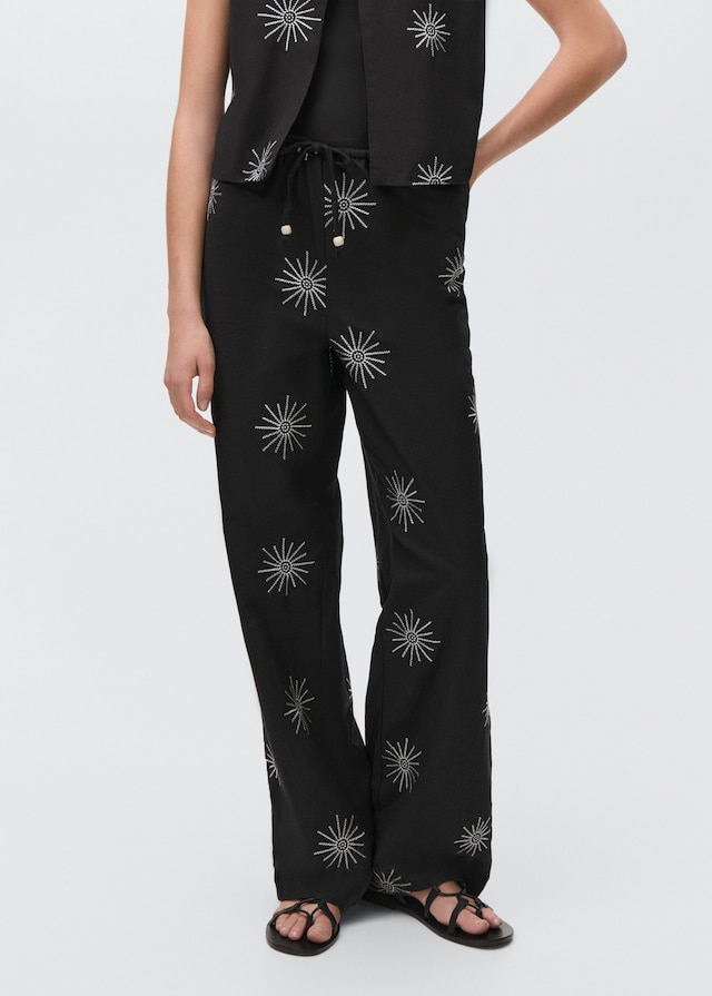 Mango Lange Hose mit Stickdetails 50% Rabatt für begrenzte Zeit